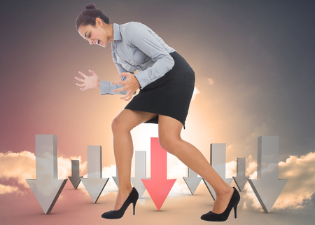 Furious businesswoman gesturing against red and grey arrows pointing against skyの写真素材
