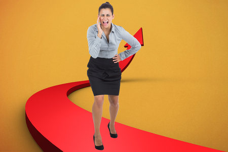 Businesswoman shouting against red arrow pointing upの写真素材