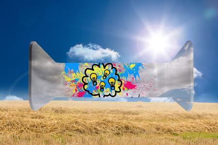 Lightbulbs on abstract screen against sunny landscapeの写真素材