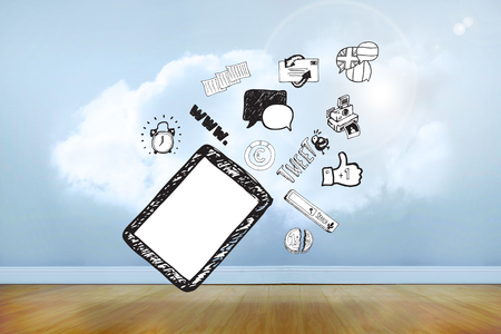 Tablet pc and app doodles against clouds in a roomの写真素材