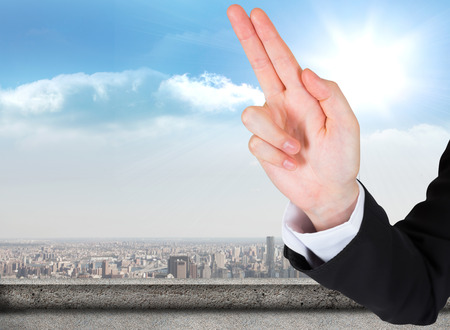 Businesswoman presenting against balcony overlooking cityの写真素材