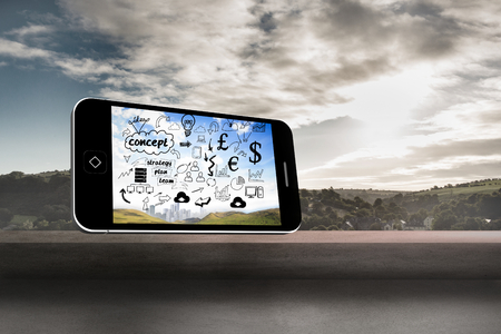 Brainstorm on smartphone screen against view of landscape from balconyの写真素材