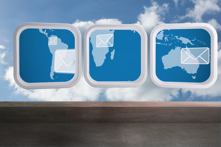 World map and email on abstract screen against balcony and cloudy skyの写真素材