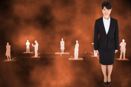 Smiling businesswoman against global connection backgroundの写真素材