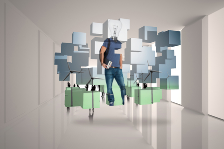 Light bulb student on abstract screen against tiny figures in bright roomの写真素材