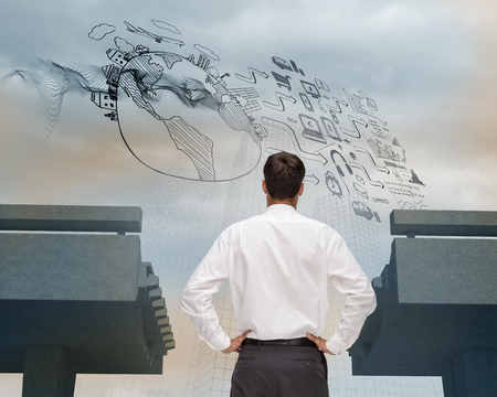 Composite image of rear view of classy young businessman posing on white backgroundの写真素材