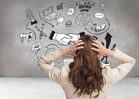 Composite image of young classy businesswoman with hands on head standing back to camera on white backgroundの写真素材