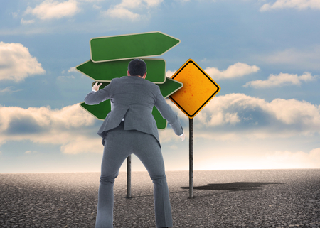 Composite image of businessman catchingの写真素材