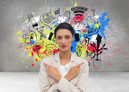 Composite image of charismatic businesswoman with her arms crossed and fingers pointingの写真素材