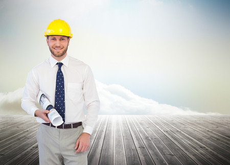 Composite image of cheerful young architect posing