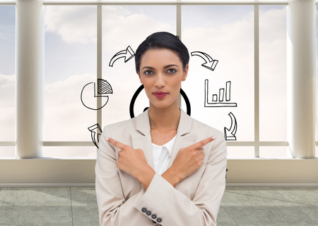 Composite image of charismatic businesswoman with her arms crossed and fingers pointingの写真素材