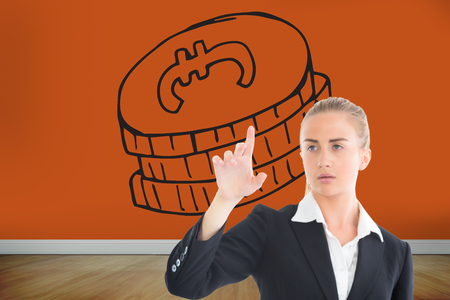 Composite image of blonde businesswoman pointing somewhereの写真素材