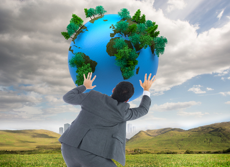 Composite image of businessman with arms raisedの写真素材