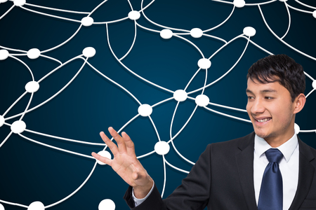 Composite image of smiling businessman touchingの写真素材