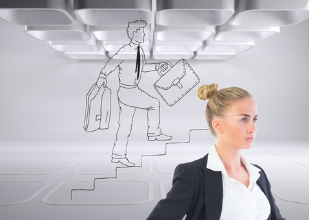 Composite image of blonde businesswoman standing with hands on hipsの写真素材