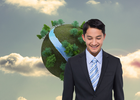 Composite image of smiling asian businessman の写真素材