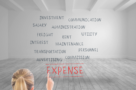 Composite image of blonde businesswoman pointing somewhereの写真素材