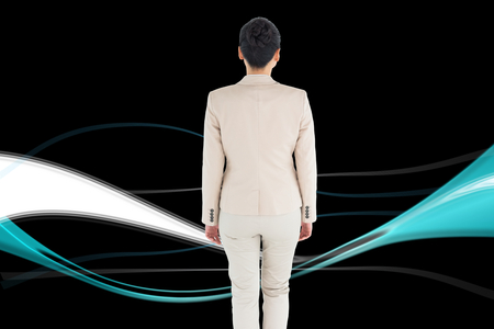 Composite image of asian businesswoman walkingの写真素材