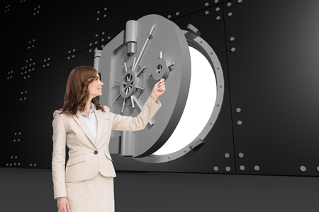 Composite image of brunette attractive businesswoman pullingの写真素材