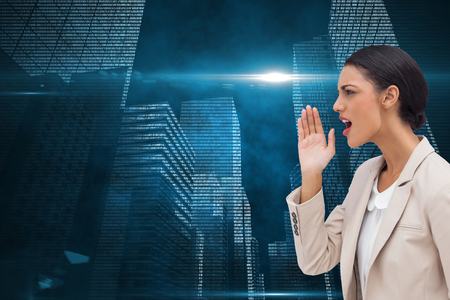 Composite image of confident businesswoman calling for someoneの写真素材