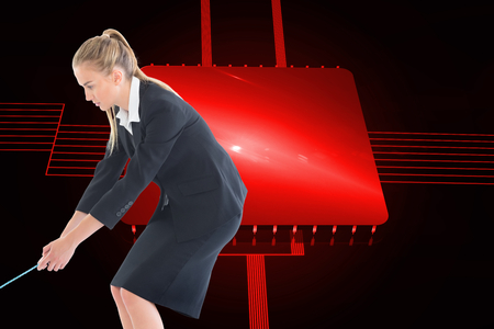 Composite image of blonde businesswoman pulling a ropeの写真素材