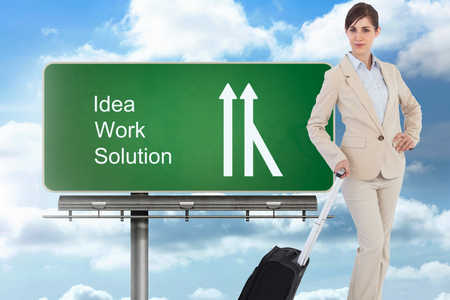 Composite image of businesswoman with suitcaseの写真素材
