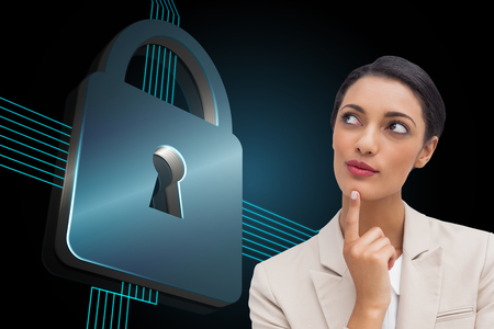 Composite image of smiling businesswoman thinkingの写真素材