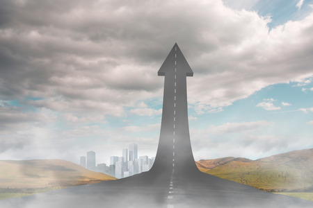 Road turning into arrowの写真素材