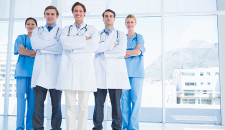 Group portrait of young doctors standing together at the hospitalの写真素材