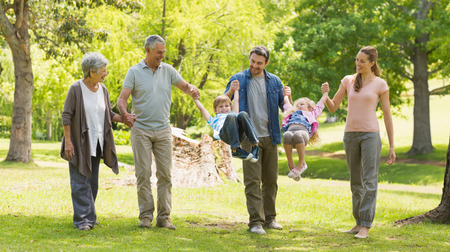 Full length of an extended family playing in the park