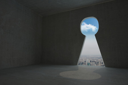 Keyhole door in dark roomの写真素材