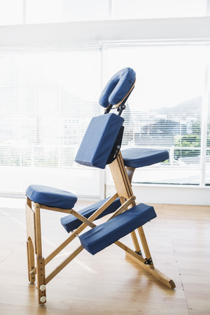 Blue massage chair in hospitalの写真素材