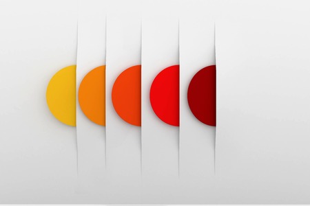 Orange red and yellow circles on white backgroundの写真素材