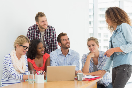 Team of designers having a meeting in creative office
