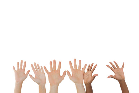 Three pairs of hands waving on white backgroundの写真素材
