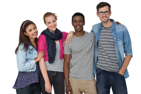 Portrait of four happy young friends standing over white background