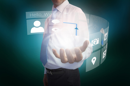 Digital composite of businessman presenting interface