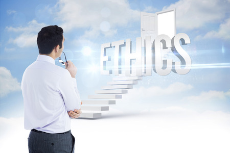 The word ethics and businessman holding glasses against steps leading to open door in the skyの写真素材
