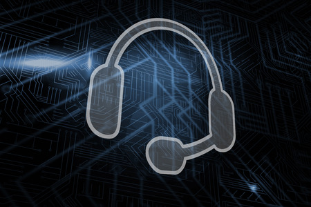 Headset against futuristic black and blue backgroundの写真素材
