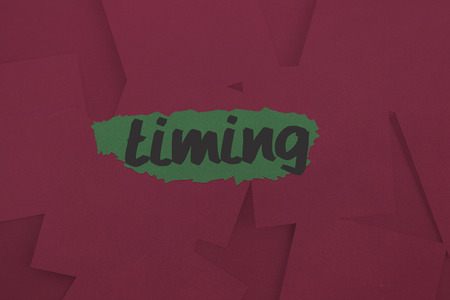 The word timing against digitally generated wine paper strewnの写真素材