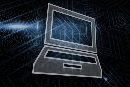 Laptop against futuristic black and blue backgroundの写真素材