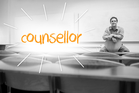 The word counsellor against lecturer sitting in lecture hallの写真素材