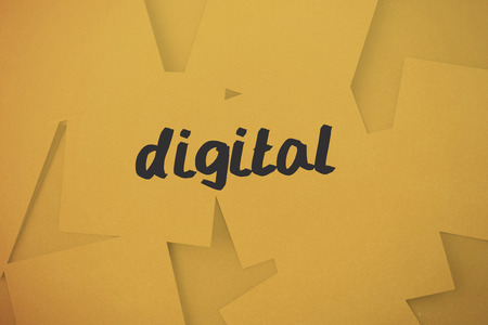 The word digital against digitally generated orange paper strewnの写真素材