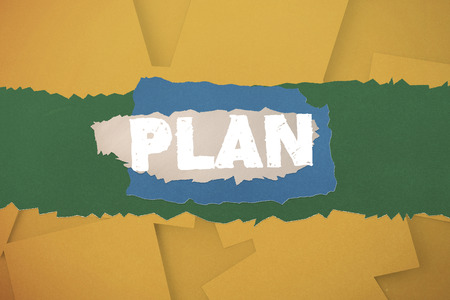 The word plan against digitally generated orange paper strewnの写真素材