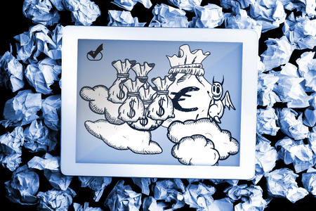 Devil with money bags doodle on digital tablet on crumpled paperの写真素材