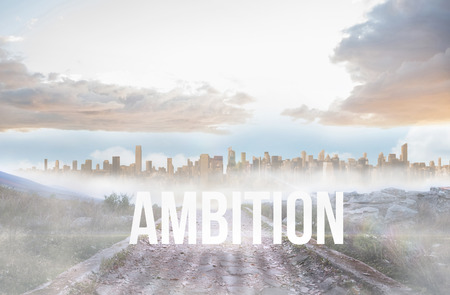 The word ambition against rocky path leading to large urban sprawlの写真素材