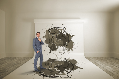 Thinking businessman against large white screen showing graphicの写真素材