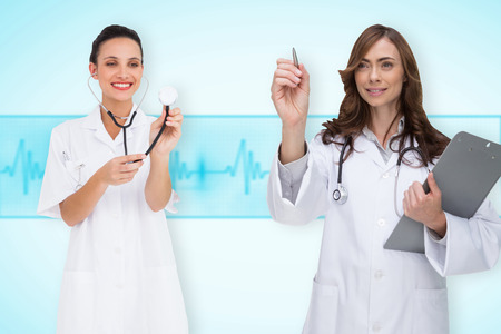 Composite image of medical team against medical background with blue ecg lineの写真素材