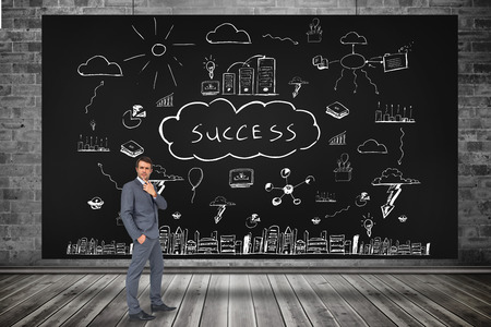 Composite image of thinking businessman against black cardの写真素材