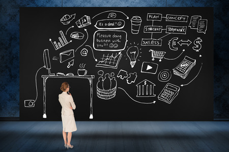 Composite image of thinking businesswoman against black cardの写真素材